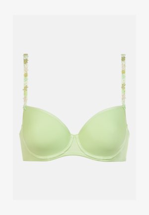 Reggiseno verde chiaro con stecche. Tessuto liscio con spalline ricamate a fiori in verde, giallo e bianco. Senza imbottitura o decorazioni sulle coppe.