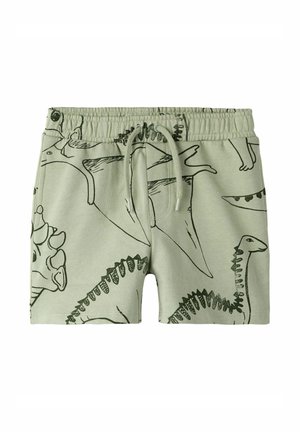 Lysegrønne børneshorts med elastisk talje og dinosaur-linjetegninger i mørkegrøn overalt.