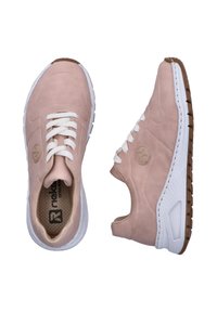 Light pink sneakers made of suede with white laces. Features a textured rubber sole and logo detail on the side. Low-cut, casual design.