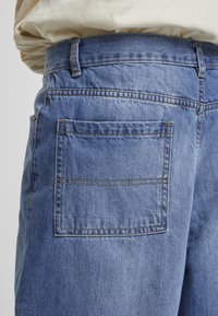 Urban Classics Jeans relaxed fit - blue