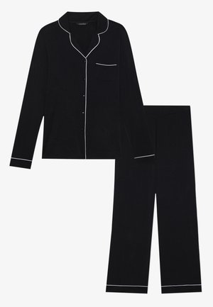 Sæt med sort pyjamas bestående af en langærmet skjorte med knapper og en brystlomme, hvide piping-detaljer og matchende løstsiddende bukser. Glat stoftekstur.