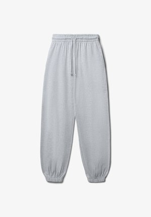 Pantaloni jogger grigi chiari realizzati in tessuto morbido, con una vita elasticizzata e cordino, e orli affusolati alle caviglie.