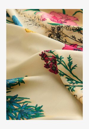 Floraler Stoff mit cremefarbenem Hintergrund, verziert mit bunten Blumenmustern in Pink, Rot, Gelb und Blau sowie detaillierten grünen Blattmotiven.