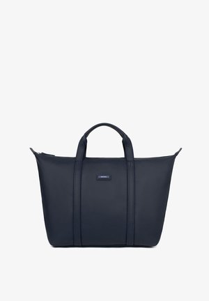Sac fourre-tout bleu marine en matériau lisse et durable, avec deux poignées robustes, des détails de couture subtils et un petit logo en accent.