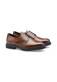 Scarpe da donna in pelle marrone con finitura liscia, design con lacci e suola in gomma resistente con un motivo di battistrada robusto.