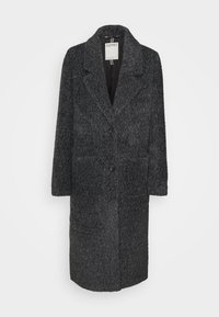 Cappotto lungo grigio scuro con tessuto testurizzato, design a un solo petto, rever a taglio e due bottoni frontali. Caratterizzato da tasche laterali.