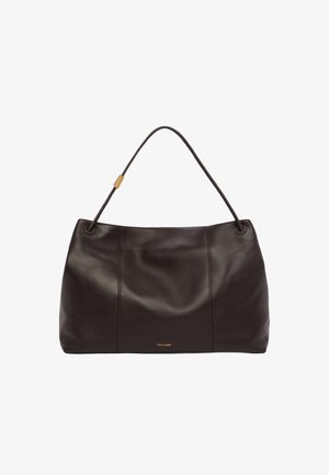 Brown leather handbag with a smooth texture, a rounded shape, and a single curved handle. Features subtle seam detailing and a gold logo.