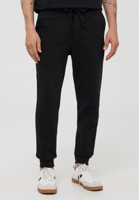 Terranova Tracksuit bottoms - black