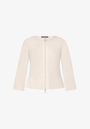 Jasnobeżowa damska kurtka z długimi rękawami, okrągłym dekoltem, dopasowaną talią i centralnym zamkiem błyskawicznym z pierścieniowymi suwakami.