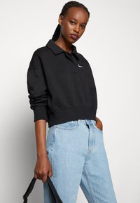 Nike Sportswear W NSW STYLE FLC CROP 3Q POLO - Camisola - black/sail
