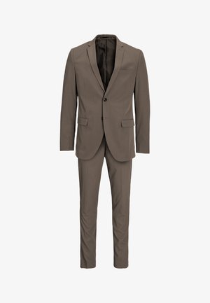 Meeste pruun kaheosaline ülikond, millel on sälguga kraega jakk kahe nööbiga ja sobivad kitsad püksid.