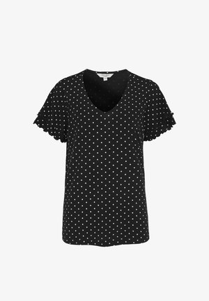 Schwarze Kurzarmbluse mit weißen Punkten, Rüschen an den Ärmelenden und V-Ausschnitt.