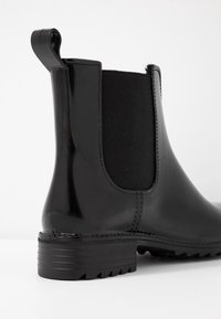 Rieker Bottes en caoutchouc - black