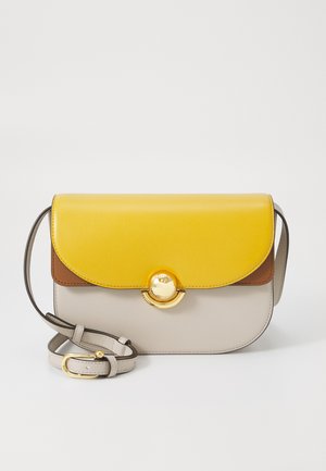 Color block handbag featuring a yellow leather flap, brown accent, and grey body. Gold hardware detail on the front. Adjustable strap.