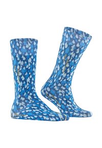 Chaussettes bleues avec un motif de gouttes de pluie dans différentes nuances, avec le texte « Restez positif » en or sur le côté. Texture lisse, longueur mi-mollet.