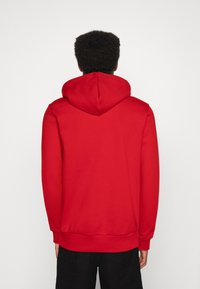 Lacoste Jersey con capucha - red