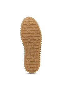 Semelle de chaussure en caoutchouc de couleur beige, présentant des motifs circulaires et des bords striés pour une meilleure adhérence. Surface texturée avec des détails de logo visibles.