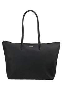 Sac cabas rectangulaire noir avec deux longues anses, fermeture éclair et petit logo crocodile vert centré près du haut.