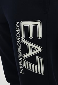 EA7 Emporio Armani PANTALONI - Träningsbyxor - blue