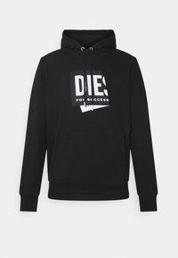 Felpa nera con cappuccio, caratterizzata da una grafica centrale con la scritta "DIES FOR SUCCESS" in bianco. Il tessuto è soffice, con una tasca a marsupio e cappuccio regolabile.