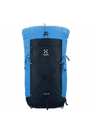Blauwe en marineblauwe wandelrugzak met een oprolontwerp, buitenzak, elastische gearloops en zichtbaarheid van het logo. Gemaakt van duurzaam materiaal.