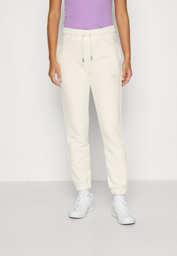TONAL SHIELD - Tracksuit bottoms - linen
