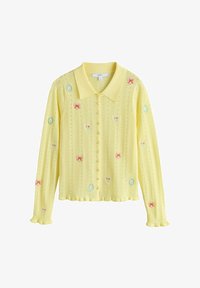 Valitud, yellow embroidered