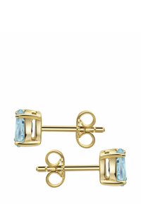 Orecchini a perno color oro con pietre rettangolari azzurro chiaro incastonate in una montatura a gabbia. Presentano metallo liscio e finitura lucida.