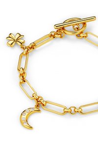 Pulsera de cadena de oro con eslabones ovalados, un encanto de trébol y un encanto de luna creciente con cinco piedras incrustadas. Cierre de palanca.