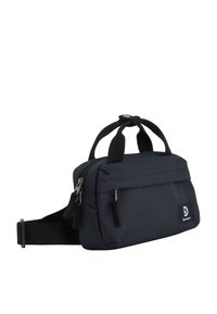 Black fabric shoulder bag with dual zipper compartments, short handles, adjustable strap, and a logo patch on the front.