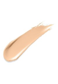 Échantillon de fond de teint liquide beige avec une texture lisse et crémeuse ainsi qu'une finition semi-mate, présenté sur un fond blanc.