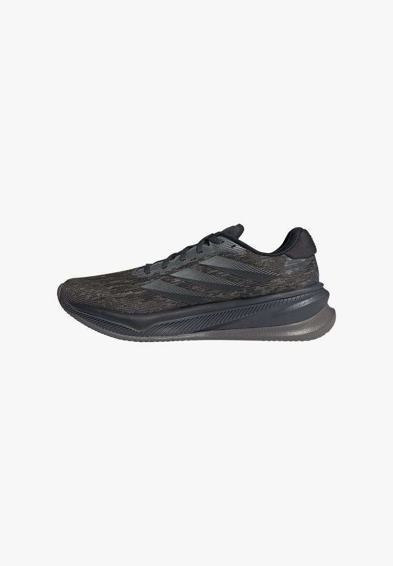 Black athletic shoe with a textured fabric upper, sleek design, and a cushioned, slightly rounded sole. Features three striped accents on the side.
