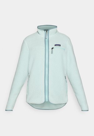 Svjetloplava flis jakna sa patentnim zatvaračem sprijeda, visokim ovratnikom i džepom na prsima. Ima teksturiranu tkaninu i bočne džepove sa patentnim zatvaračima.