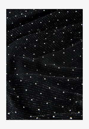 Must mustriline kangas, millel on tekstuuriga pind, sisaldab juhuslikult laotatud hõbedasi sädelevaid siidikesi täppide mustris ja õrn läige kogu pinnal.