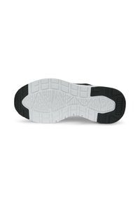 Black and white sneaker outsole featuring a textured rubber sole, geometric pattern, and molded accents for enhanced grip and durability.