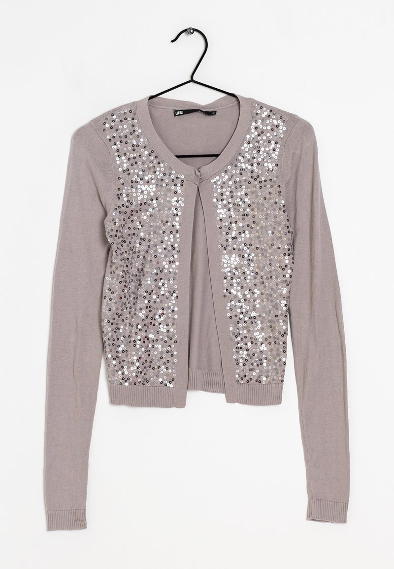 Svetle šedý kardigan s dlouhými rukávy, s přední částí zdobenou flitry. Měkký pletený materiál s žebrovanými detaily na manžetách a dole.