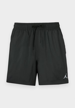 Fekete rövid sportnadrág, könnyű anyagból készült, rugalmas derékkal és húzózsinórral, az oldalon pedig egy ezüst logó található.