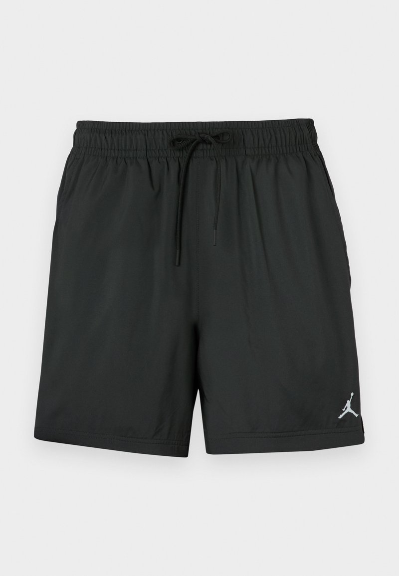 Shorts de sport noirs courts en matière légère, dotés d'une taille élastique avec cordon de serrage et d'un logo argenté sur le côté gauche.