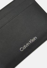 Calvin Klein CONCISE CARDHOLDER UNISEX - Portafoglio -  black