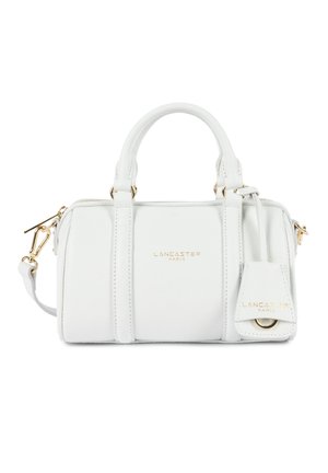 Sac à main Lancaster Paris en cuir blanc avec double poignée, bandoulière amovible, ferrures dorées et logo frontal.