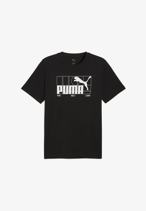 Melna kokvilnas t-krekls ar īsām piedurknēm, kas rotāts ar baltu grafiku ar Puma logo un tekstu "TĀS NR.1 LOGO" iekšā taisnstūra robežās.