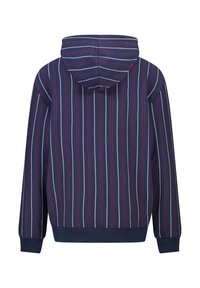 Huppari tummansinisellä pohjalla, jossa on pystysuoria raitoja punaisena, valkoisena ja vaaleansinisenä. Ominaisuuksina rento istuvuus sekä ribbireunat hihansuissa ja helmassa.