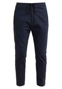 Marineblauwe tapered-fit broek met elastische tailleband en zwarte trekkoord, voorzien van zijzakken en een gladde afwerking.