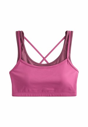 Roze sportbeha met dubbele bandjes die op de rug kruisen, gemaakt van glad stretchstof, plat weergegeven op een witte achtergrond.