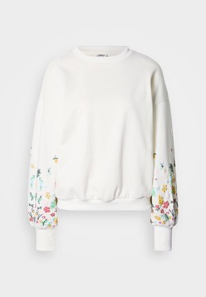 Biely mikinový sveter s dlhými rukávmi s kvetinovou výšivkou v rôznych farbách na rukávoch. Žebrovaný výstrih a manžety. Jemná textúra látky.