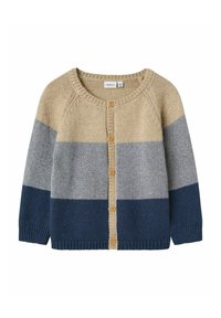 Pletena cardigan s horizontalnimi črtami v bež, svetlo sivi in mornarsko modri barvi. Ima okroglo ovratnico, dolge rukave in lesene gumbe.