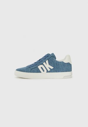 Denim sneakers featuring a blue textured fabric, white rubber sole, and large white "DK" branding on the side. }}">