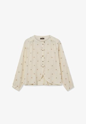 Kreemjas pika varrukaga pluus ümmarguse kaelusega, ees oleva nööpide reas, õrna lillemustriga ja õlgadel ning varrukaotstes krõpsudega kogutud detailidega.