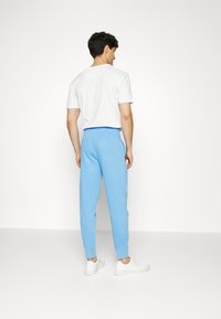 GAP HERITAGE LOGO - Calças de fato de treino - union blue