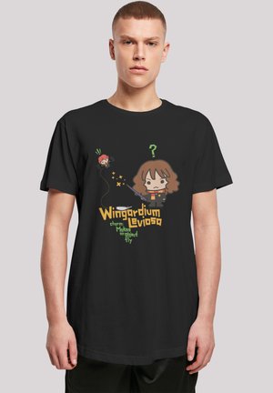 Black cotton t-shirt featuring a cartoon character holding a wand, with text "Wingardium Leviosa" in yellow and green, and star accents.